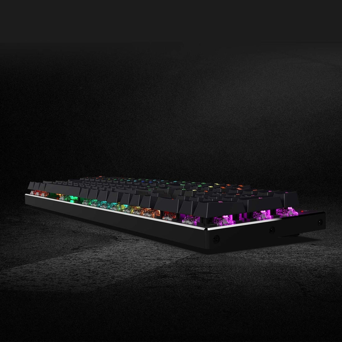 Side view of a mechanical gaming keyboard with RGB backlighting on a dark surface